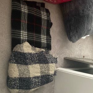 Two poncho style sweaters.